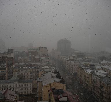 Snow blankets Kyiv on Orthodox Palm Sunday in Ukraine, on April 17, 2022. Many elderly Ukrainians with dementia have woken up to a new war, day after day. (Lynsey Addario/The New York Times) — NO SALES