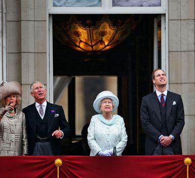 FILE - Britain's Queen Elizabeth II, center, Prince Charles, 2nd left, Camilla, Duchess of Cornwall, left, Prince William, 3rd right, Kate Duchess of Cambridge. 2nd right, and Prince Harry, appear on the balcony of Buckingham Palace in central London, Tuesday, June 5, 2012, to conclude the four-day Diamond Jubilee celebrations. The balcony appearance is the centerpiece of almost all royal celebrations in Britain, a chance for the public to catch a glimpse of the family assembled for a grand photo to mark weddings, coronations and jubilees. (AP Photo/Lefteris Pitarakis, File)