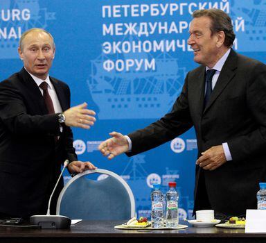 Russian President Vladimir Putin, left, and Germany's former Chancellor Gerhard Schroeder attend an economic forum in St.Petersburg, Russia, Thursday, June 21, 2012. Gerhard Schroeder left the German chancellery after a narrow election defeat in 2005 with an ambitious overhaul of the countryâ€™s welfare state beginning to kick in and every chance of becoming a respected elder statesman. Fast-forward to last week: German lawmakers agreed to shut down Schroederâ€™s taxpayer-funded office, the European Parliament called for him to be sanctioned, and his own party set a mid-June hearing on applications to have him expelled. Schroederâ€™s association with the Russian energy sector turned the 78-year-old into a political pariah in Germany after the invasion of Ukraine. (AP Photo/Dmitry Lovetsky, pool)