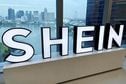 FILE PHOTO: A Shein logo is pictured at the company's office in the central business district of Singapore, October 18, 2022. REUTERS/Chen Lin/File Photo
