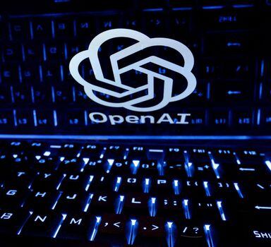 FILE PHOTO: A keyboard is placed in front of a displayed OpenAI logo in this illustration taken February 21, 2023. REUTERS/Dado Ruvic/Illustration/File Photo