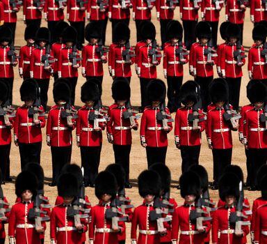 Members of the Household division take part in the Trooping the Colour parade at Horse Guards, in London, Thursday, June 2022, on the first of four days of celebrations to mark the Platinum Jubilee. The events over a long holiday weekend in the U.K. are being held to celebrate the Queen Elizabeth II's 70 years of service. (AP Photo/Matt Dunham)