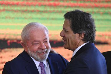 O presidente Lula e o ministro Fernando Haddad; titular da Fazenda tem cargo no conselho de Itaipu