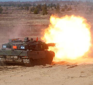 German Army Leopard 2 tank fires during NATO enhanced Forward Presence battle group military exercise Crystal Arrow 2021 in Adazi, Latvia March 26, 2021 REUTERS/Ints Kalnins