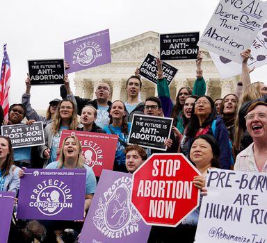 Demonstrators protest outside of the U.S. Supreme Court, Monday, May 16, 2022, in Washington. A draft opinion suggests the U.S. Supreme Court could be poised to overturn the landmark 1973 Roe v. Wade case that legalized abortion nationwide, according to a Politico report released. (AP Photo/Mariam Zuhaib)