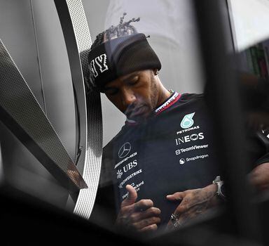 Mercedes' British driver Lewis Hamilton walks in the paddock ahead of the Dutch Formula One Grand Prix, in Zandvoort on August 24, 2023. The 2023 Dutch Grand Prix will take place on August 27, 2023. (Photo by John THYS / AFP)