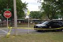 TOPSHOT - Sheriff crime scene tape is seen outside of Robb Elementary School as State troopers guard the area in Uvalde, Texas, on May 24, 2022. - An 18-year-old gunman killed 14 children and a teacher at an elementary school in Texas on Tuesday, according to the state's governor, in the nation's deadliest school shooting in years. (Photo by Allison Dinner / AFP)