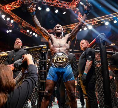 MIAMI, FLORIDA - APRIL 08: Israel Adesanya of Nigeria celebrates after knocking uot Alex Pereira of Brazil during their Middleweight fight at Kaseya Center on April 08, 2023 in Miami, Florida.   Carmen Mandato/Getty Images/AFP (Photo by Carmen Mandato / GETTY IMAGES NORTH AMERICA / Getty Images via AFP)