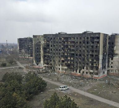 An aerial view shows residential buildings which were damaged during Ukraine-Russia conflict in the besieged southern port city of Mariupol, Ukraine March 18, 2022. Picture taken with a drone. REUTERS/Pavel Klimov