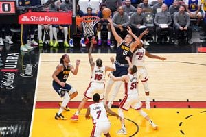 Jun 9, 2023; Miami, Florida, USA; Denver Nuggets center Nikola Jokic (15) shoots the ball against the Miami Heat during the first half in game four of the 2023 NBA Finals at Kaseya Center. Mandatory Credit: Kyle Terada-USA TODAY Sports