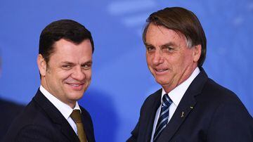O ministro da Justiça, Anderson Torres, e o presidente Jair Bolsonaro em evento no Planalto nesta segunda-feira, 27. Foto: Evaristo Sá/AFP