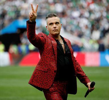 FILE PHOTO: Soccer Football - World Cup - Opening Ceremony - Luzhniki Stadium, Moscow, Russia - June 14, 2018   Robbie Williams performs during the opening ceremony   REUTERS/Carl Recine/File Photo