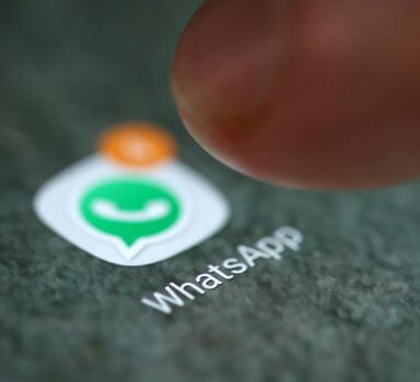 FILE PHOTO: The WhatsApp app logo is seen on a smartphone in this picture illustration taken September 15, 2017. REUTERS/Dado Ruvic/Illustration/File Photo