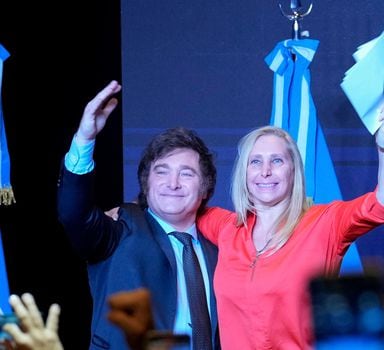 Javier Milei, presidential candidate of the Liberty Advances coalition, right, celebrates with his sister Karina Milei after being elected president in a runoff election in Buenos Aires, Argentina, Sunday, Nov. 19, 2023. (AP Photo/Natacha Pisarenko)