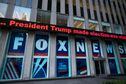 FILE - A headline about President Donald Trump is displayed outside Fox News studios in New York on Nov. 28, 2018. Fox Corp. chairman Rupert Murdoch acknowledged in a deposition that some Fox News commentators endorsed the false allegations by the former president and his allies that the 2020 presidential election was stolen and that he did not step in to stop them from promoting the claims. The documents unsealed Monday, Feb. 27, 2023, are at the heart of a defamation lawsuit against the cable news giant by Dominion Voting Systems. (AP Photo/Mark Lennihan, File)