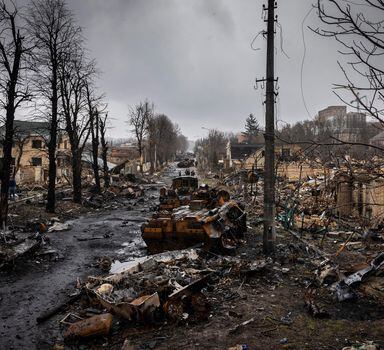 Widespread destruction in Bucha, a suburb of Kyiv, Ukraine, on Sunday, April 3, 2022. The fight between democracy and autocracy is happening not only in Ukraine but also within several European democracies, through elections rather than military conflict.  (Ivor Prickett/The New York Times)