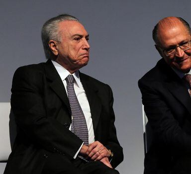 Brazil's President Michel Temer (L) and Sao Paulo's Governor Geraldo Alckmin attend the National Car Dealers Federation (FENABRAVE) fair in Sao Paulo, Brazil August 8, 2017. REUTERS/Paulo Whitaker