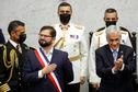 AME2618. VALPARAÍSO (CHILE), 11/03/2022.-Recém empossado presidente Gabriel Boric recebe aplausos do agora ex-presidente Sebastián Piñera.