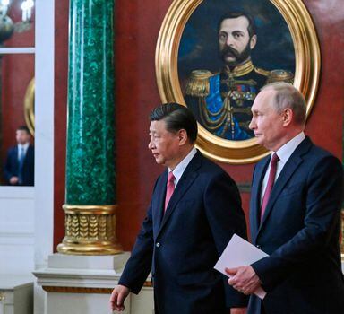 Russian President Vladimir Putin, right, and Chinese President Xi Jinping arrive to attend a signing ceremony following their talks at The Grand Kremlin Palace, in Moscow, Russia, Tuesday, March 21, 2023. (Grigory Sysoyev, Sputnik, Kremlin Pool Photo via AP)