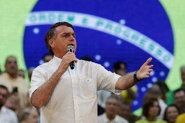 Presidente Bolsonaro durante convenção do PL onde se referiu aos ministros do Supremo como 'surdos de capa preta'.