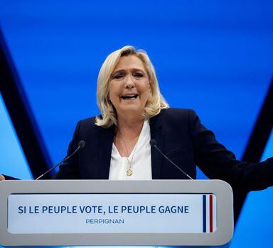 Marine Le Pen, leader of French far-right National Rally (Rassemblement National) party and candidate for the 2022 French presidential election, speaks during a political campaign rally in Perpignan, France, April 7, 2022. REUTERS/Albert Gea