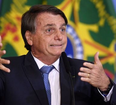 Brazilian President Jair Bolsonaro delivers a speech during a meeting called "Brazil for Life and Family" and promoted by an anti-abortion movement, at Planalto Palace in Brasilia, on June 7, 2022. - Bolsonaro in his speech attacked the Supreme Court, the Electoral Justice and its judges. (Photo by EVARISTO SA / AFP)