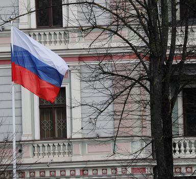 Riga (Latvia), 23/03/2022.- A Russian flag waves outside the building of the Embassy of Russia in Riga, Latvia, 23 March 2022. Latvia has decided to expel three Russian embassy staff from Latvia in connection with the Russian aggression in Ukraine and the fact that the activities of these persons are incompatible with the status of a diplomat. The deportees must leave Latvia by 23:59 on March 23. (Letonia, Rusia, Ucrania) EFE/EPA/TOMS KALNINS

