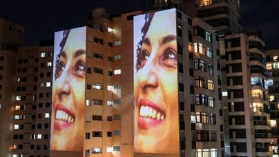 Images of late activist and councilwoman Marielle Franco are projected onto a building during a tribute to mark the third anniversary of her murder in Sao Paulo, Brazil March 14, 2021. REUTERS/Amanda Perobelli. Foto: Amanda Perobelli/Reuters