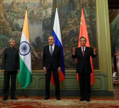 Russia's Foreign Minister Sergei Lavrov, India's Foreign Minister Subrahmanyam Jaishankar and China's State Councillor Wang Yi pose for a picture during a meeting in Moscow, Russia September 10, 2020. Russian Foreign Ministry/Handout via REUTERS  ATTENTION EDITORS - THIS IMAGE WAS PROVIDED BY A THIRD PARTY. NO RESALES. NO ARCHIVES. MANDATORY CREDIT.