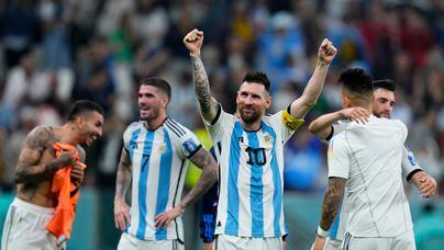 Argentina's Lionel Messi celebrates defeating Croatia 3-0 in a World Cup semifinal soccer match at the Lusail Stadium in Lusail, Qatar, Tuesday, Dec. 13, 2022. (AP Photo/Natacha Pisarenko)
