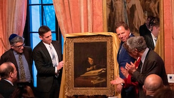 A obra "A Scholar Sharpening His Quill", pintada por Koninck em 1639, foi entregue aos Schloss em uma cerimônia que aconteceu no consulado da França em Nova York. Foto: Don Emmert / AFP