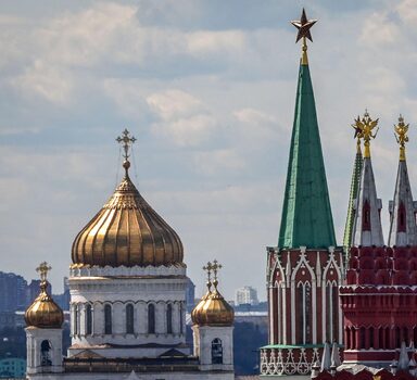 This picture taken on May 2, 2022 shows the Cathedral of Christ the Saviour (L) and towers of the Kremlin  in central Moscow. (Photo by Yuri Kadobnov/ AFP)