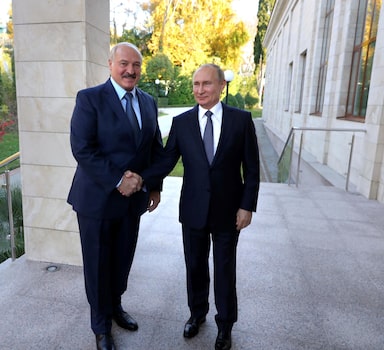 Russian President Vladimir Putin shakes hands with Belarusian President Alexander Lukashenko during a meeting in Sochi, Russia December 7, 2019. Sputnik/Mikhail Klimentyev/Kremlin via REUTERS ATTENTION EDITORS - THIS IMAGE WAS PROVIDED BY A THIRD PARTY.