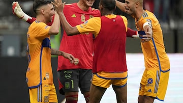 Tigres' Fernando Gorriaran, goalkeeper Nahuel Guzman, Luis Quinones and Guido Pizarro, from left, celebrate after defeating the Vancouver Whitecaps 5-3 on penalty kicks after a 1-1 draw during a Leagues Cup soccer match in Vancouver, British Columbia, Friday, Aug. 4, 2023. (Darryl Dyck/The Canadian Press via AP)