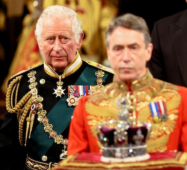 Britain's Prince Charles proceeds behind the Imperial State Crown through the Royal Gallery for the State Opening of Parliament at the Palace of Westminster in London, Britain, May 10, 2022. REUTERS/Hannah McKay/Pool      TPX IMAGES OF THE DAY