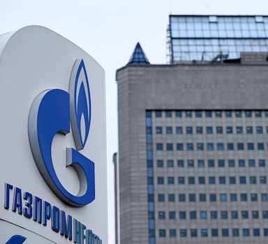 The logo of Russia's energy giant Gazprom is pictured at one of its petrol stations in front of Gazprom's Moscow office on April 27, 2022. - Russia's energy giant Gazprom said on April 27, 2022 it had stopped all gas supplies to Poland and highly dependent Bulgaria after not receiving payment in rubles from the two EU members. President Vladimir Putin last month said Russia will only accept payment for deliveries in its national currency, with buyers required to set up ruble accounts or have their taps turned off.