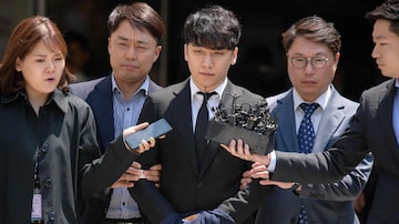 O ex-integrante da boyband BIGBANG Lee Seung-hyun, mais conhecido como Seungri, que foi condenado a três anos de prisão por incitar prostituição. Foto: Ed Jones / AFP