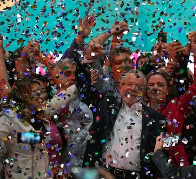 Confetti showers former Brazilian President Luiz Inacio Lula da Silva and supporters after the announcement of his candidacy for the countryâ€™s upcoming presidential election, in Sao Paulo, Brazil, Saturday, May 7, 2022. Brazil's general elections are scheduled for Oct. 2, 2022. (AP Photo/Andre Penner)