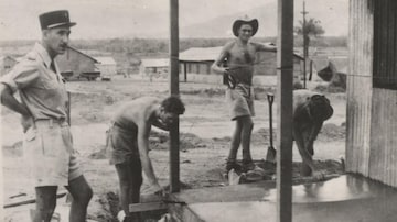In an undated image provided by the Foreign Legion Documentation Center, a member of the French Foreign Legion wore PalladiumÕs original Pallabrousse boot, far left, while building barracks with other legionnaires in Hanoi, Vietnam, in 1954. The military force famously made up of recruits from across the globe is entering uncharted territory Ñ the fashion world Ñ with its first ever product collaboration: a menÕs boot inspired by footwear worn in combat zones by the forceÕs legionnaires. (Foreign Legion Documentation Center via The New York Times) Ñ NO SALES; FOR EDITORIAL USE ONLY WITH NYT STORY FRENCH COMBAT BOOTS BY ELIZABETH PATON FOR NOV. 8, 2022. ALL OTHER USE PROHIBITED. Ñ