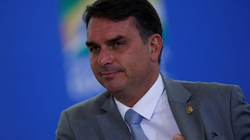 Brazilian Senator Flavio Bolsonaro reacts during a ceremony at the Planalto Palace in Brasilia, Brazil February 2, 2022. REUTERS/Adriano Machado