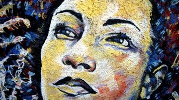 Pintura de Marielle Franco é exposta no bairro do Estácio, região central do Rio, local do assassinato. Foto: Wilton Júnior / Estadão
