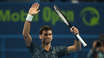 Novak Djokovic comemora vitória sobre Damir Dzumhur. Foto: Karim Jaafar/AFP