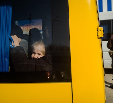 A community transport vehicle arrives in Zaporizhzhia, Ukraine, on Saturday from Mariupol. MUST CREDIT: Photo for The Washington Post by Wojciech Grzedzinski