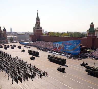 FILE - Russian military vehicles roll down Red Square Red Square during a rehearsal for the Victory Day military parade in Moscow, Russia, on May 7, 2019. Some in the West think Russian President Vladimir Putin may use the Victory Day on May 9 when Russia celebrates the defeat of Nazi Germany in World War II to officially declare that war is underway in Ukraine and announce a mobilization _ the claim rejected by the Kremlin. (AP Photo/Alexander Zemlianichenko, Pool, File)