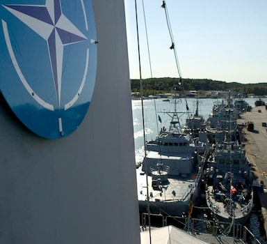 FILE- NATO naval mine countermeasure vessels berth in Turku, Finland, during the international Northern Coasts 2014 (NOCO14) military exercise on Aug. 29, 2014. Finland appears on the cusp of joining NATO. Sweden could follow suit. By year's end, they could stand among the alliance's ranks. Russia's war in Ukraine has provoked a public about face on membership in the two Nordic countries. They are already NATO's closest partners, but should Russia respond to their membership moves they might soon need the organization's military support. (Roni Lehti/Lehtikuva via AP)