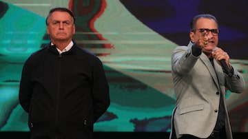 Jair Bolsonaro e o pastor Silas Malafaia durante culto na zona norte do Rio. Foto: Pedro Kirilos/Estadão