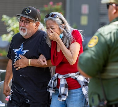 A woman cries as she leaves the Uvalde Civic Center, Tuesday May 24, 2022, in Uvalde, Texas An 18-year-old gunman opened fire Tuesday at a Texas elementary school, killing multiple children and a teacher and wounding others, Gov. Greg Abbott said, and the gunman was dead. ()