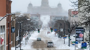 The Iowa State Capitol Building is seen in the distance in Des Moines, Iowa, Saturday, Jan. 13, 2024. (AP Photo/Andrew Harnik)