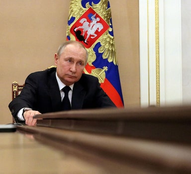 FILE PHOTO: FILE PHOTO: Russian President Vladimir Putin attends a meeting with government members via a video link in Moscow, Russia March 10, 2022. Sputnik/Mikhail Klimentyev/Kremlin via REUTERS/File Photo/File Photo