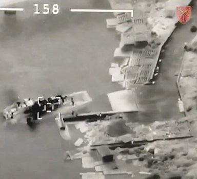 An aerial view shows Ukrainian UAV Bayraktar targeting Russian landing craft vessel at Zmiinyi (Snake) Island, Ukraine, in this still image from a handout video released by Press service of Ukrainian Ground Forces on May 7, 2022. Ukrainian Ground Forces/Handout via REUTERS  THIS IMAGE HAS BEEN SUPPLIED BY A THIRD PARTY. MANDATORY CREDIT